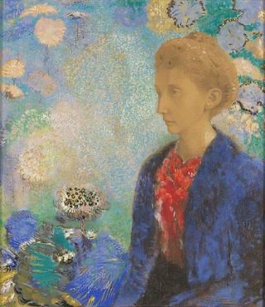 Portr&auml;t einer Frau mit blonder Frisur, blauem Mantel und rotem Oberteil, umgeben von bunten, abstrakten Blumenmotiven.